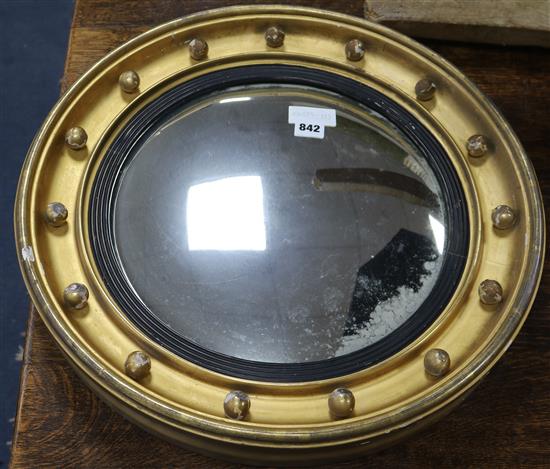 A Regency style gilt convex wall mirror 1ft 8in.